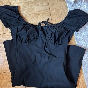 Black mini dress with puffy sleeves. Never worn.